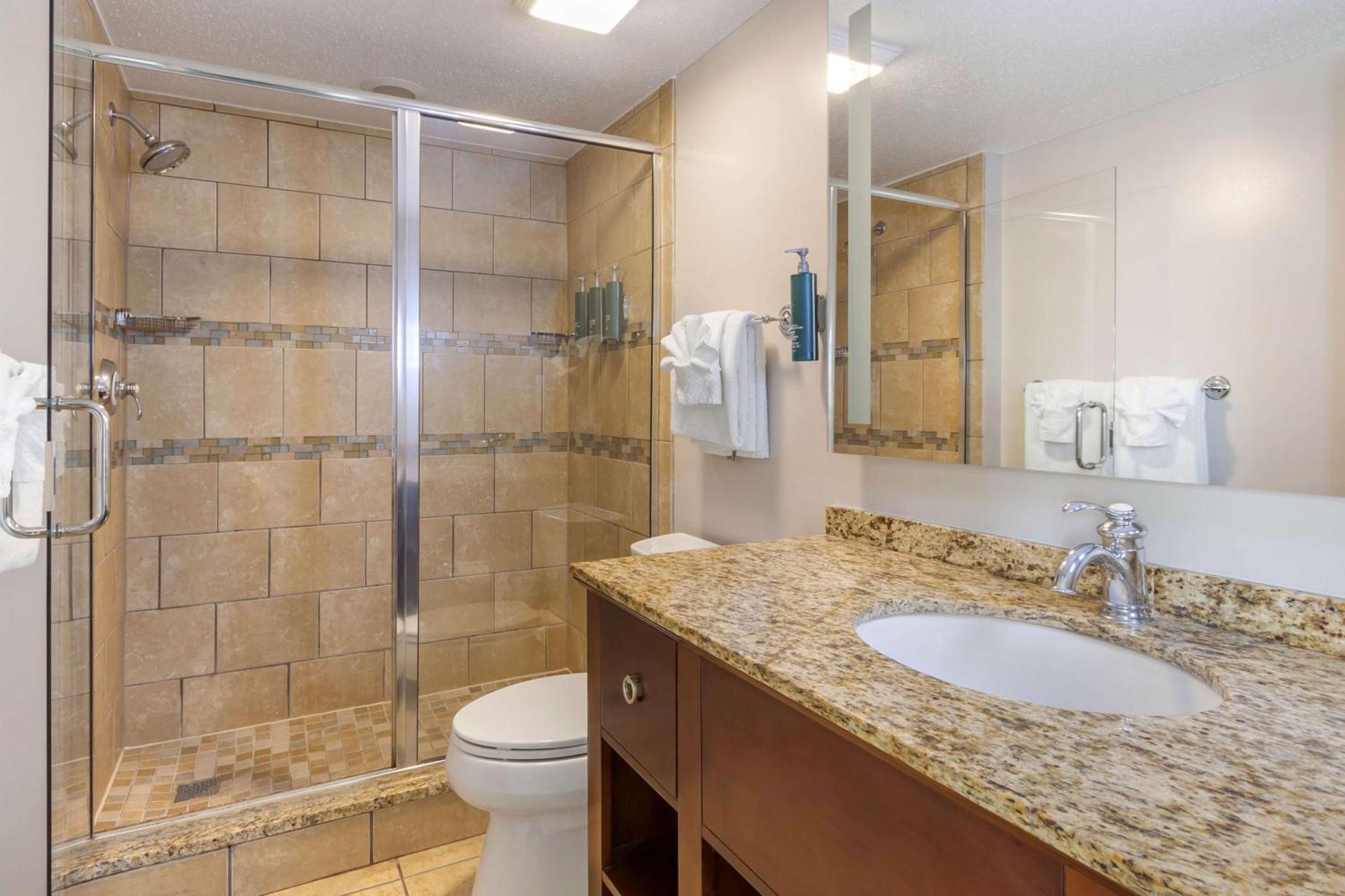 Two-Bedroom King Suite with Two Queen Beds and Partial Ocean View